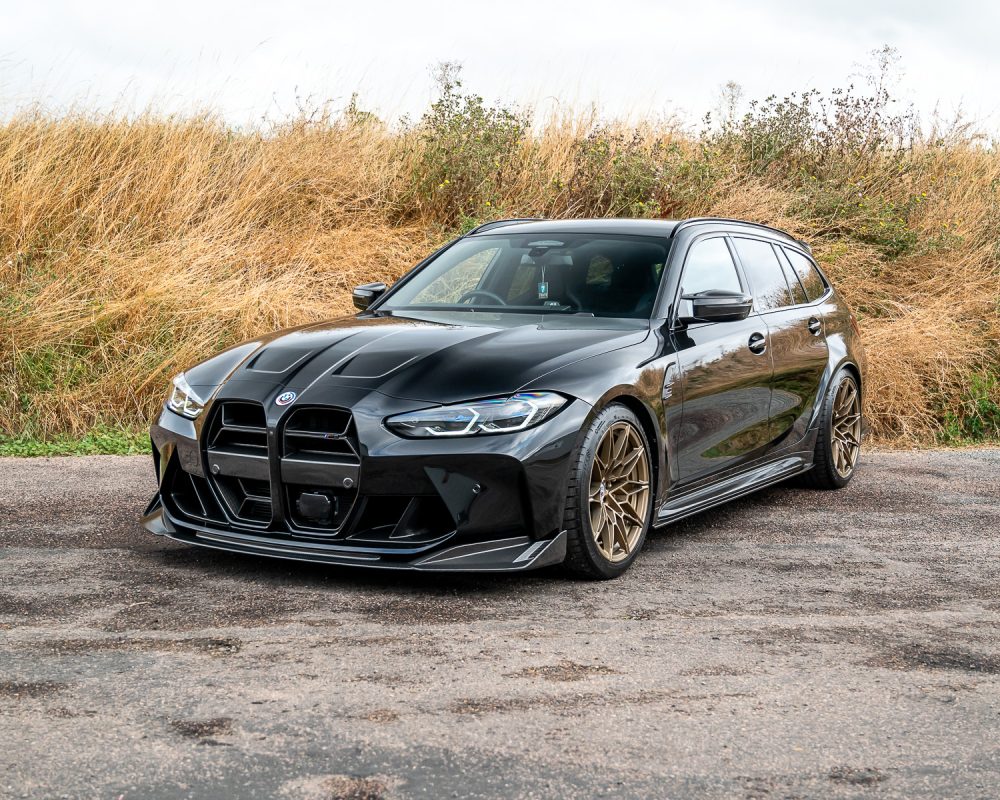 WIN A BMW M3 COMPETITION TOURING + £5000